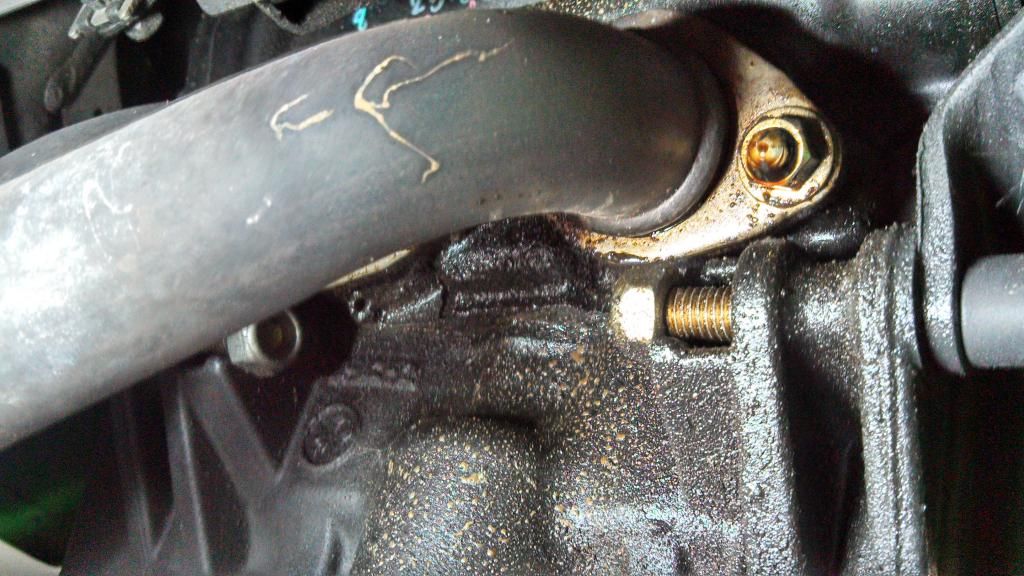HELP "Oil Leaking from headers when on rear stand" !!! RiderForums