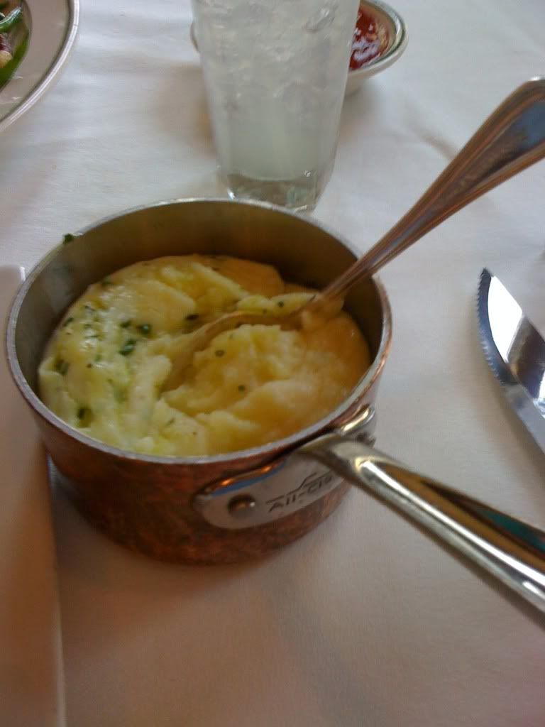 Melted Butter With Whipped Potatoes in an All-Clad Pot Melted Butter With Whipped Potatoes in an All-Clad Pot